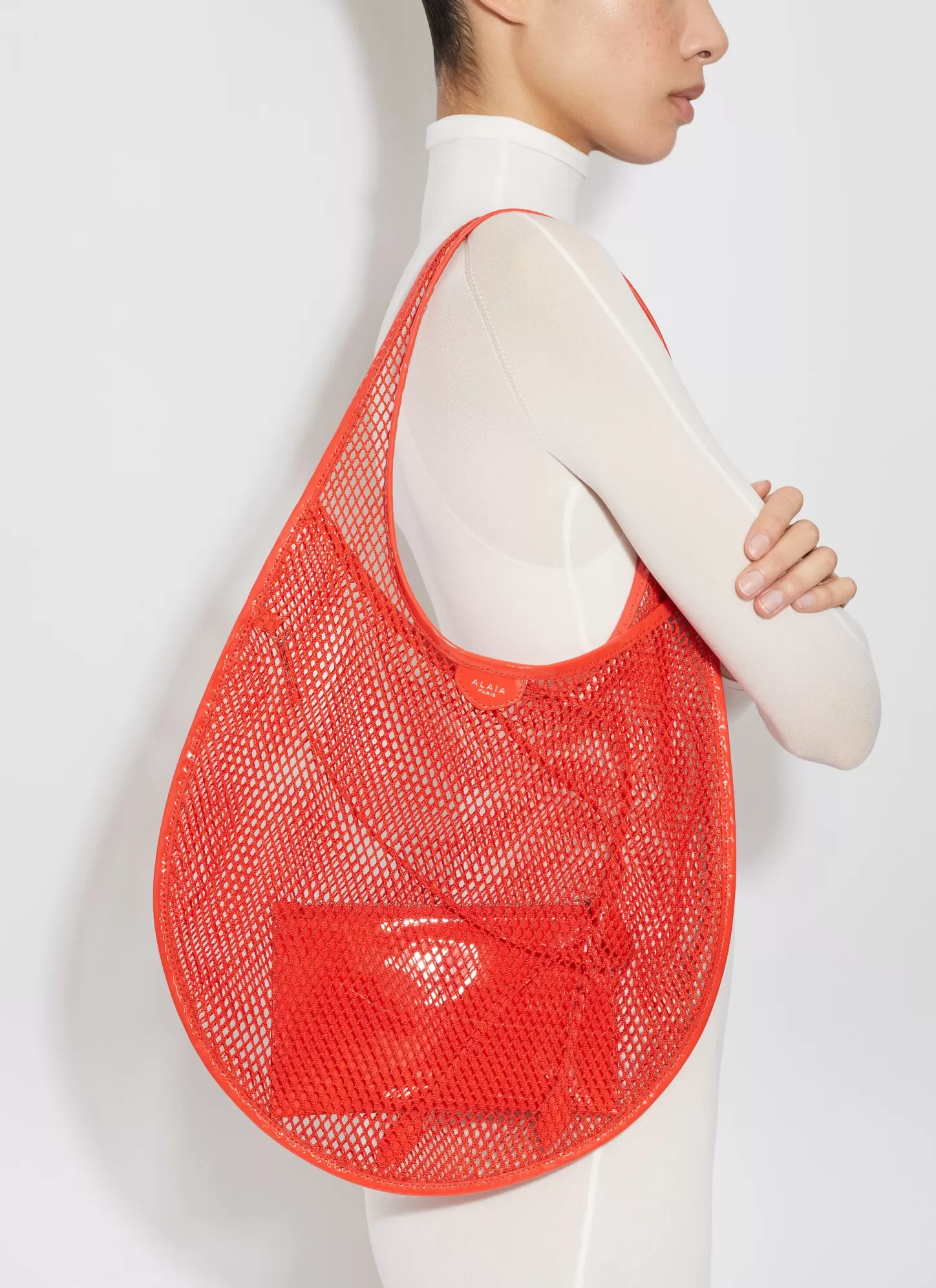 Alaïa ONE PIECE MEDIUM BAG IN FISHNET Orange Clearance